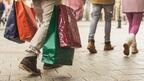 The Conference Board’s Consumer Confidence Index fell to 88.7 in November with consumers worried about higher prices, tariffs, and the U.S. government shutdown, which ended Nov. 18. Stock image of consumers shopping in the winter