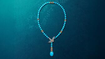 From the new “Bird on a Rock by Tiffany” collection is this high jewelry lariat necklace in platinum and 18-karat yellow gold with a nearly 16-carat turquoise drop, 54 cabochon turquoise beads, turquoise accents, diamonds, and rubies for the bird’s eyes. ($325,000). (Image courtesy of Tiffany & Co.) Tiffany & Co. Bird on a Rock by Tiffany High Jewelry Lariat