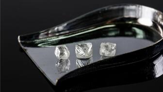 Rough diamonds from De Beers’ Gahcho Kué mine in Canada. Reports surfaced last week that Anglo American, which owns an 85 percent stake in De Beers, has identified a buyer for the diamond miner and marketer, which has been up for sale since 2024. Rough diamonds from De Beers’ Gahcho Kue mine in Canada