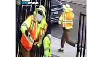 Surveillance image of Watch King robbery suspect