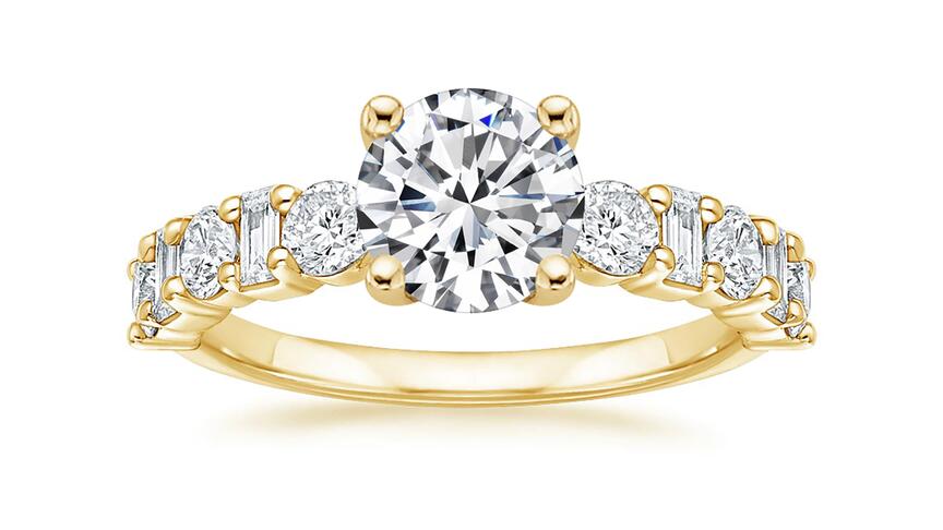 The “Jolie” diamond engagement ring in 18-karat yellow gold with alternating emerald-cut and round brilliant diamonds from Brilliant Earth’s “Mosaics” collection. The jewelry retailer reported growing engagement ring sales in Q2. Brilliant Earth Jolie Mosaics engagement ring