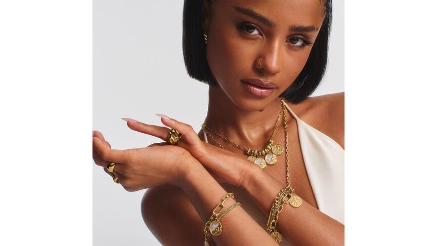 Brand ambassador Tyla wears jewels from the new “Pandora Talisman” collection. The Danish jewelry giant posted a 3 percent increase in revenue in its third quarter. Tyla Pandora Talisman collection