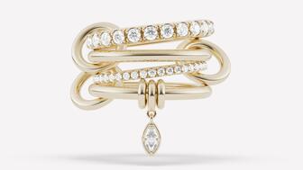 One of the new styles in Spinelli Kilcollin’s “Wren” collection is the “Inara” ring in 18-karat yellow gold featuring a marquise-cut diamond charm and two bands with pavé diamonds ($18,500). Spinelli Kilcollin Inara Ring