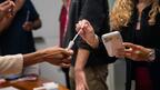 Woman holding testing swab