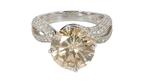 This fancy light brown diamond ring, gifted to Dionne Warwick by the Sultan of Brunei, is estimated to sell for $8,000 to $12,000 at Julien’s “The Dionne Warwick Collection” sale. The online-only auction started last week and is open for bidding until Oct. 21. Dionne Warwick brown diamond ring from Sultan of Brunei