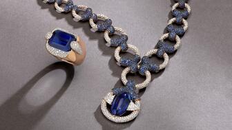 The “Eye of Tanzanite” necklace centers on a 15.30-carat marquise-cut cabochon tanzanite flanked by two trillion-cut diamonds with sapphire and diamond pavé, while the “Pin-Up” ring features a 19.39-carat rectangular-cut tanzanite accented by diamonds, both in 18-karat rose gold. All pieces are price upon request. Pomellato Eye of Tanzanite Necklace and Pin-Up Ring
