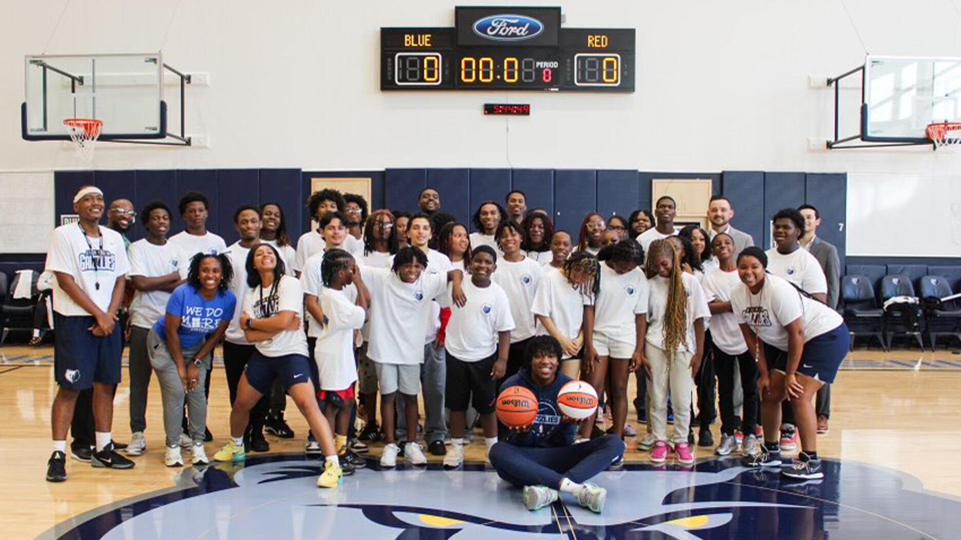 Sissy’s Log Cabin partnered with the NBA’s Memphis Grizzlies and local nonprofit Streets Ministries to provide more than 30 students with an afternoon of hands-on instruction with Grizzlies player GG Jackson and Junior Grizzlies coaches, pictured above, as well as dinner, school supplies, t-shirts, and signed posters. Sissy’s Log Cabin Back to School and Bling