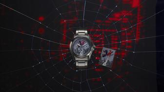 Spider-Man Citizen watch and pin on a web
