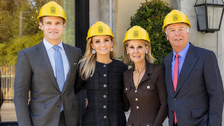 The Boulle family is renovating the deBoulle Diamond & Jewelry flagship store in Dallas, which opened in 2001. Pictured from left to right are Nick Boulle, Emma Boulle, and their parents and store founders Karen Boulle and Denis Boulle. Boulle family in hard hats