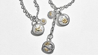 John Hardy’s “Modern Talisman” capsule collection of pendants features five motifs across two sizes: the Bali starling, a lotus, a butterfly, the naga Balinese dragon, and (not pictured) a seashell. John Hardy Modern Talisman Collection Campaign Imagery