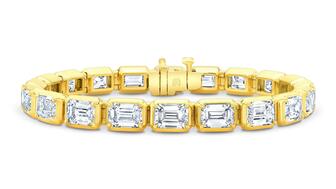 Diamond huggies, studs, tennis necklaces, bangles, and charms are among the top diamond jewelry trends forecasted for the holiday season. Pictured is a Rahaminov Diamonds bracelet with emerald-cut diamonds totaling 20.18 carats in 18-karat yellow gold ($115,960). Rahaminov Diamonds Emerald-Cut Diamond Bracelet