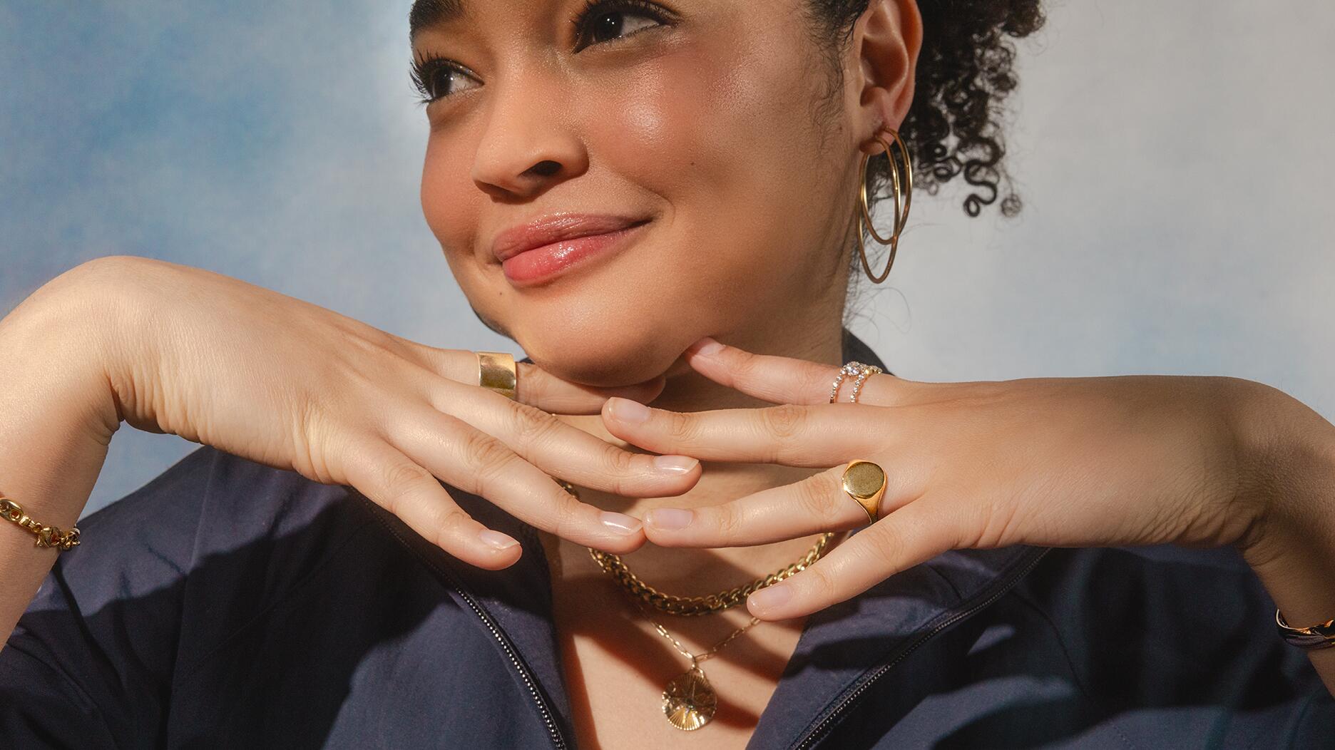 An image from the “Own It” campaign from Signet-owned retailer Zales. The jewelry giant posted 3 percent year-over-year sales growth in the second quarter of its fiscal year. Woman with hands crossed wearing jewelry