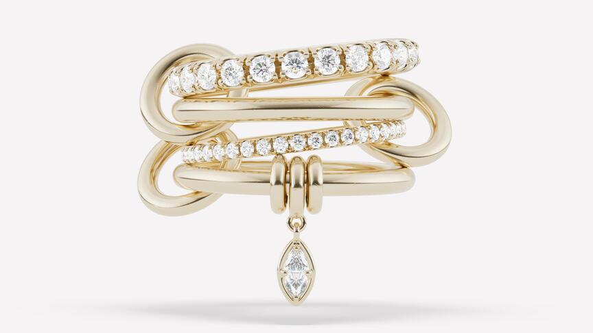 One of the new styles in Spinelli Kilcollin’s “Wren” collection is the “Inara” ring in 18-karat yellow gold featuring a marquise-cut diamond charm and two bands with pavé diamonds ($18,500). Spinelli Kilcollin Inara Ring
