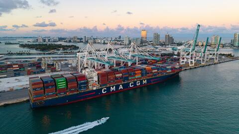 Stock image of container ship in port  