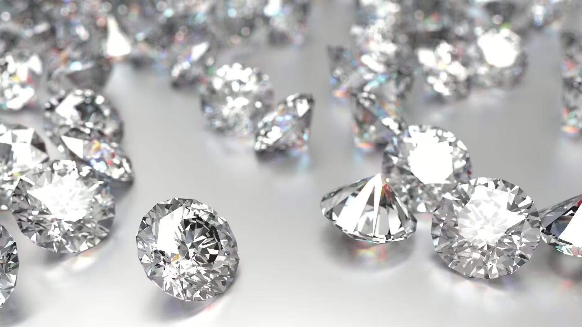 Stock image of loose polished diamonds