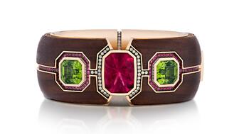 The deadline to qualify for early bird pricing for the AGTA Spectrum & Cutting Edge awards is Sept. 25, and the final deadline is Oct. 9. Pictured is the “Elements” bracelet from Somewhere in the Rainbow Gem and Jewelry Collection, in collaboration with Marc Höllmüller, which took home Best of Show in the Spectrum division last year. “Elements” bracelet best of show AGTA Spectrum 2025