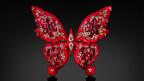 “The Soul of Flame II” brooch designed by Austy Lee is an 18-karat rose gold and red enamel butterfly set with unheated Mozambican rubies as well as fancy-color and white diamonds. It is the centerpiece of “Rubies,” a new exhibition on display at the Harvard Museum of Natural History. Harvard Rubies Exhibit The Soul of Flame II Brooch by Austy Lee