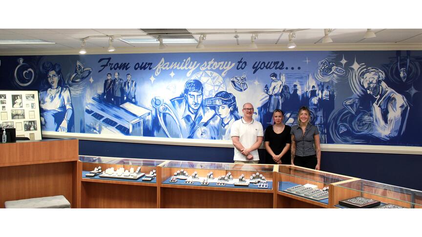 Family-owned jeweler D. Geller & Son partnered with Kennesaw State University art students, pictured above, on a custom mural for its Kennesaw, Georgia, store. D. Geller & Son store mural