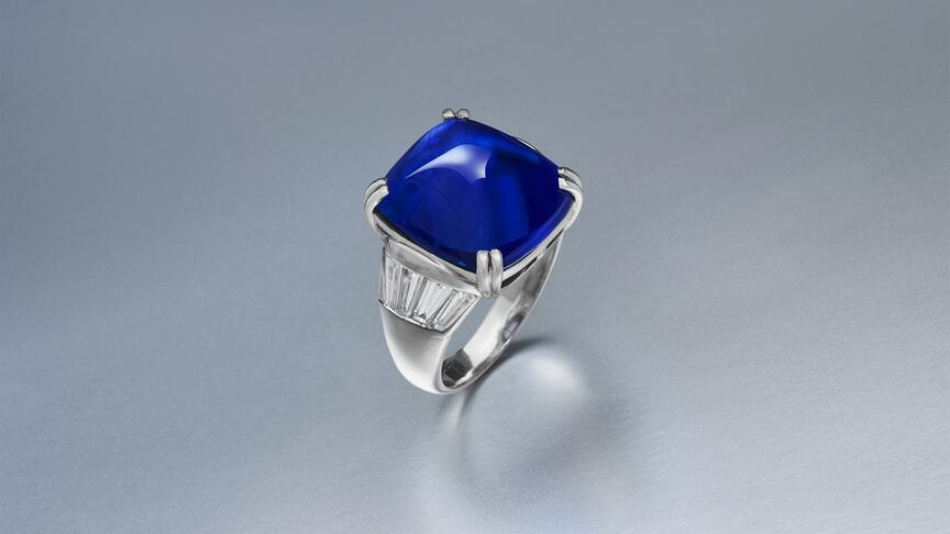 A platinum ring featuring a 16.58-carat Kashmir cabochon sapphire with tapered baguette-cut diamonds sold for $1 million at Christie’s online jewelry sale. Its pre-sale estimate was $800,000 to $1.2 million. Christies Kashmir sapphire ring