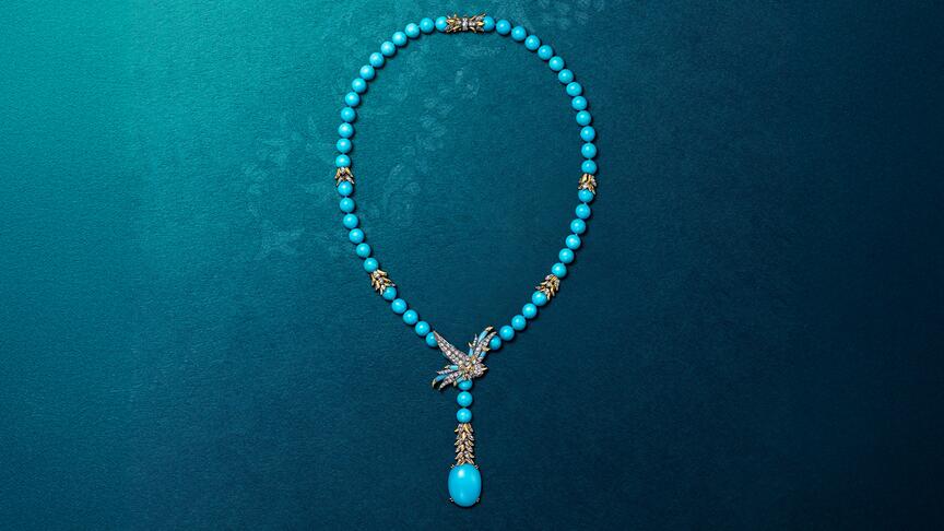 From the new “Bird on a Rock by Tiffany” collection is this high jewelry lariat necklace in platinum and 18-karat yellow gold with a nearly 16-carat turquoise drop, 54 cabochon turquoise beads, turquoise accents, diamonds, and rubies for the bird’s eyes. ($325,000). (Image courtesy of Tiffany & Co.) Tiffany & Co. Bird on a Rock by Tiffany High Jewelry Lariat